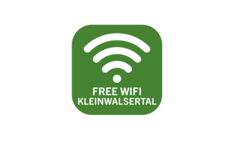 A green sign with the symbol for Wi-Fi. It says "FREE WIFI KLEINWALDERTAL". | © Kleinwalsertal Tourismus